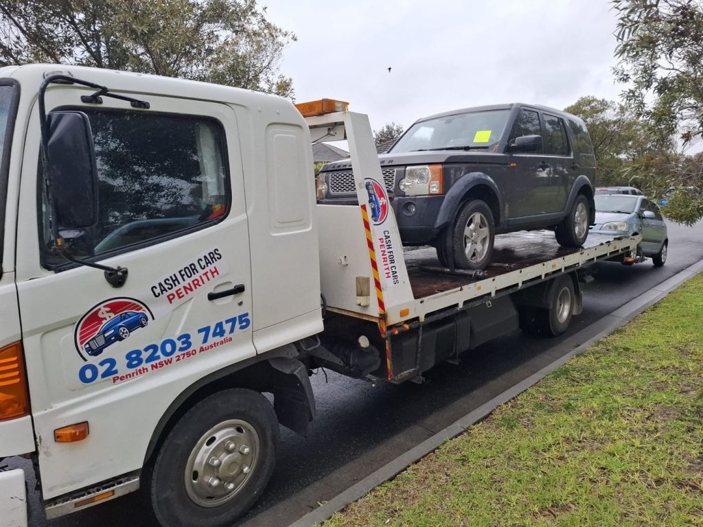 Grey Land Rover Discovery 4WD on the Cash For Cars Penrith tilt-tray truck